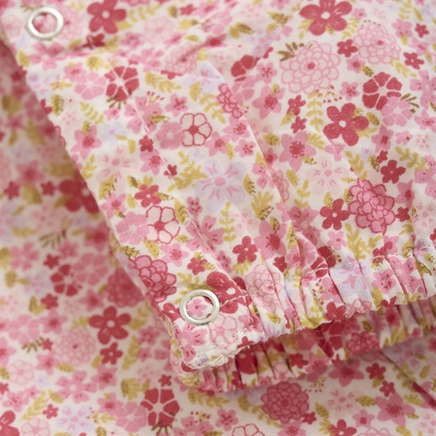 Minymo Pink Dogwood Onesie AOP w. Lining