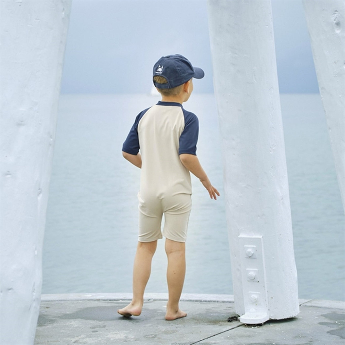 Petit Crabe Latte/Blue Multi Color Onesie with Zipper