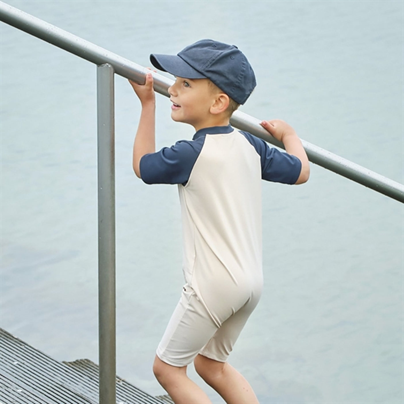 Petit Crabe Latte/Blue Multi Color Onesie with Zipper