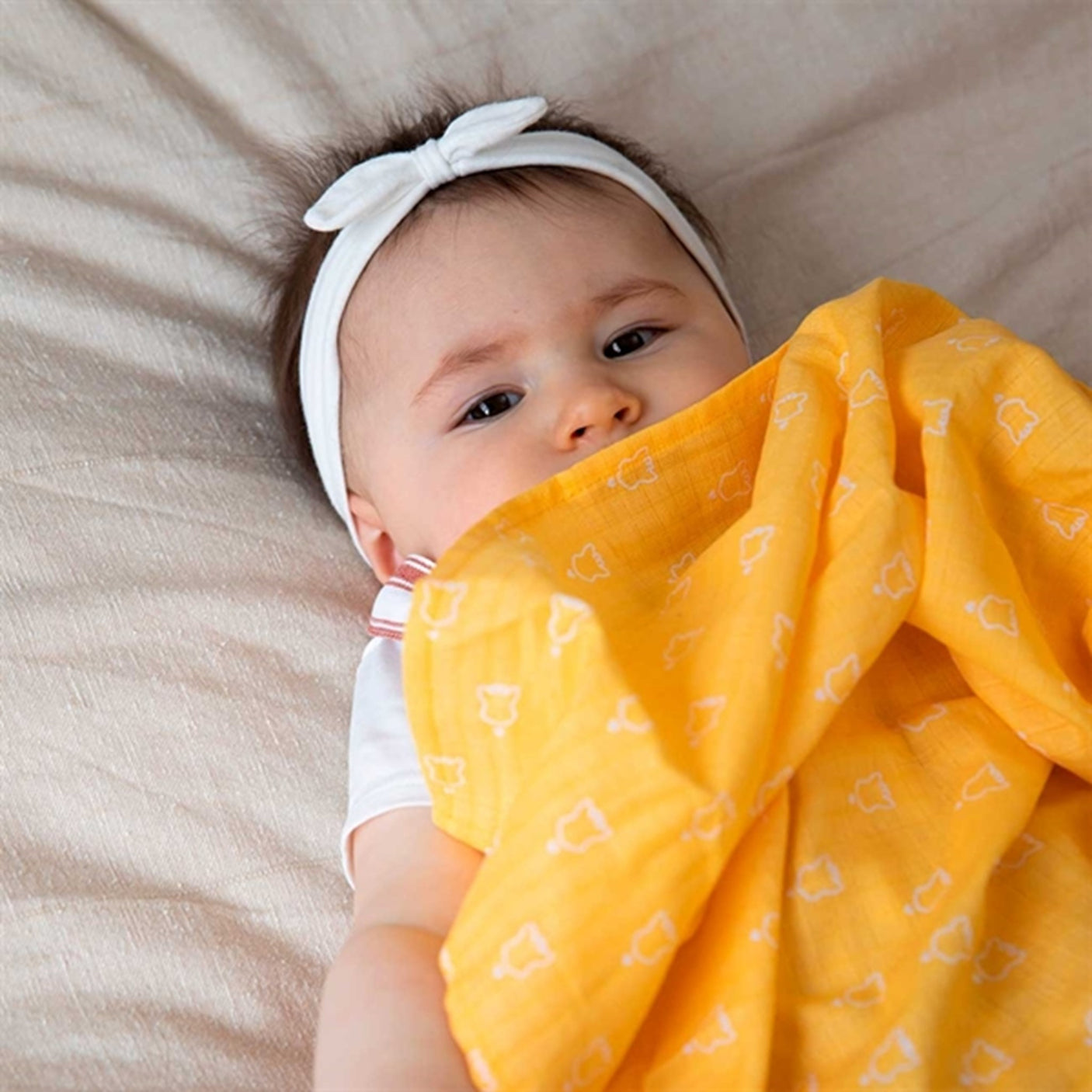 Sophie la Girafe 4 Colored Swaddles Set