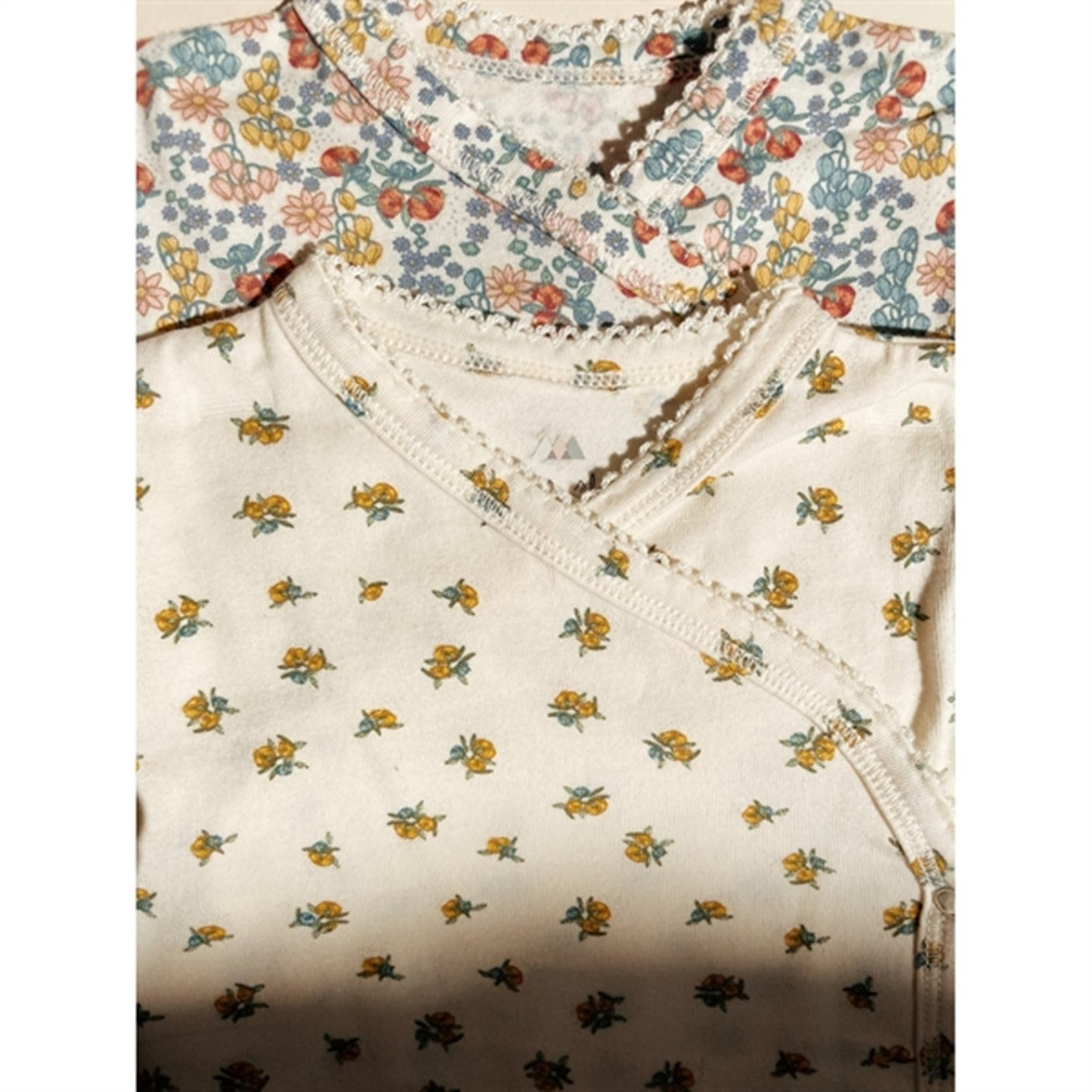 Konges Sløjd Peonia Limone Basis Newborn Onesie