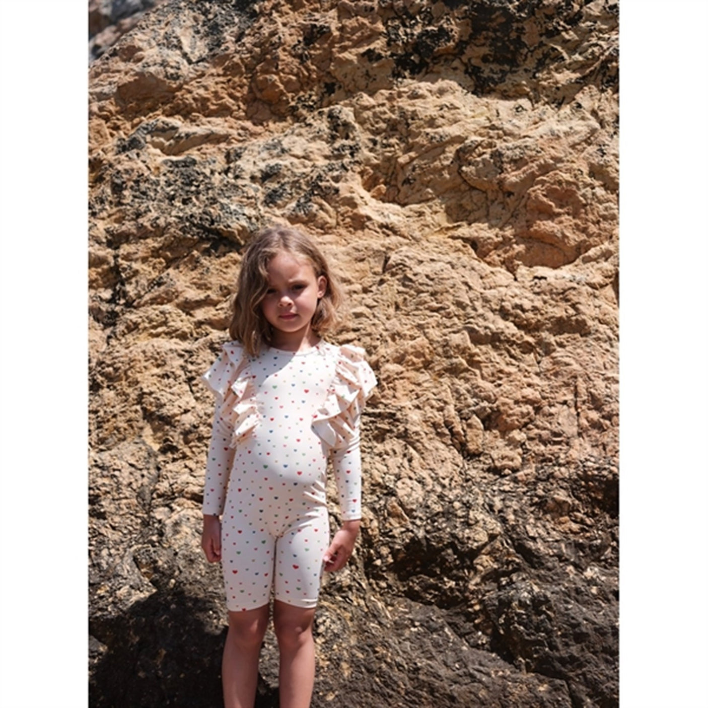 Konges Sløjd Multi Hearts Manuca Frill UV Swim Onesie