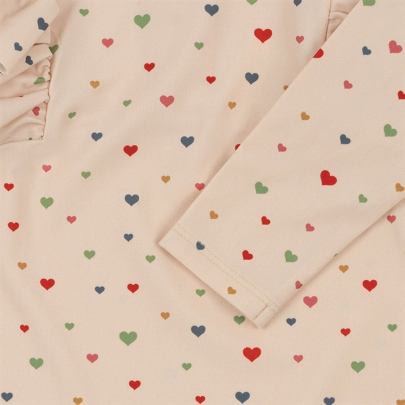 Konges Sløjd Multi Hearts Manuca Frill UV Swim Onesie