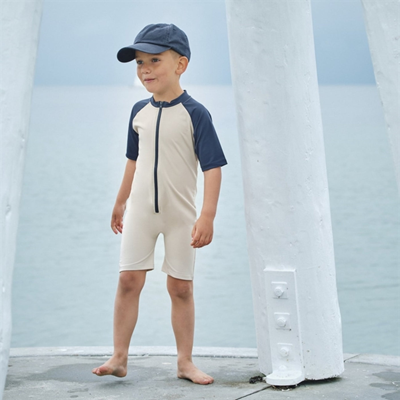 Petit Crabe Latte/Blue Multi Color Onesie with Zipper