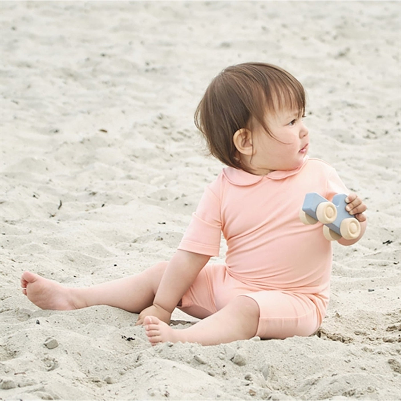 Petit Crabe Rose Nude Palma Onesie with Zipper