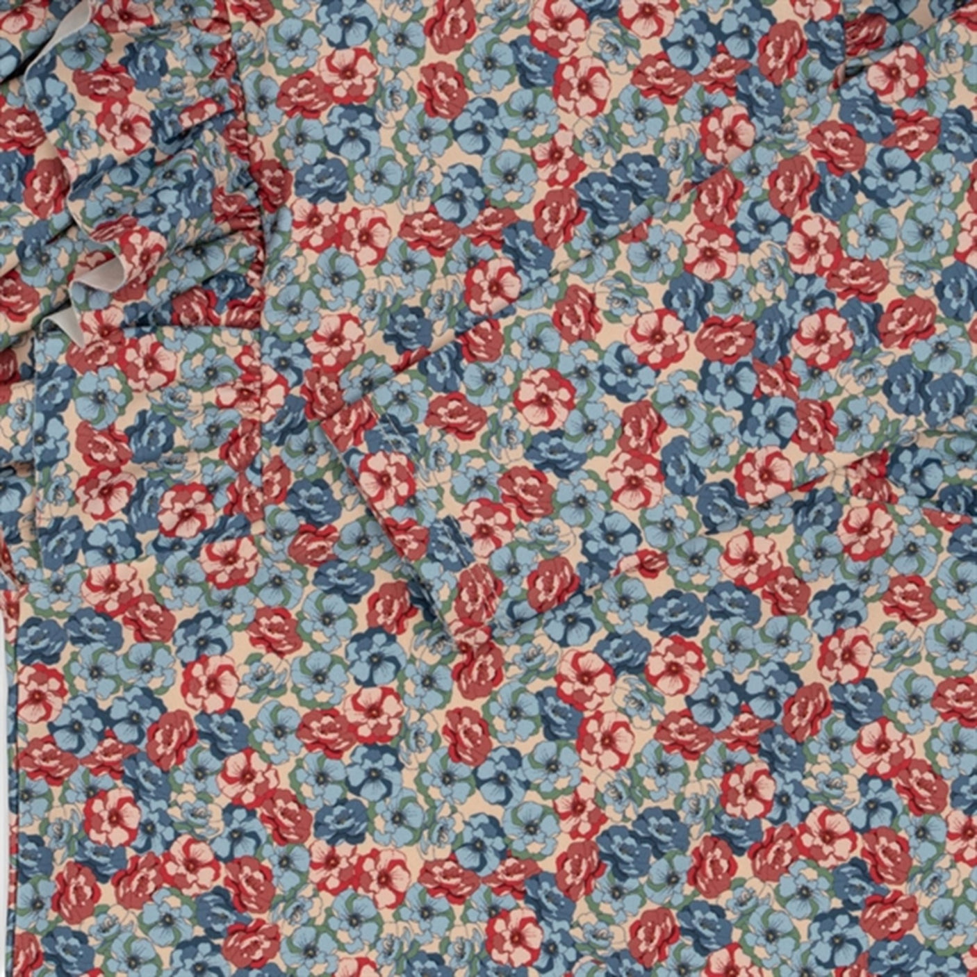 Konges Sløjd Manuca Frill UV Onesie Rosie Blue